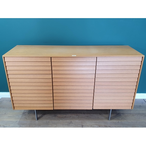 19 - A Terence Woodgate Sussex Plinth slatted Sideboard, with three fitted drawers, above three cupboard ... 