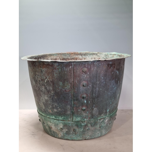 2 - A patinated studded Copper, 11.5