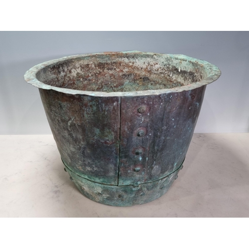 2 - A patinated studded Copper, 11.5