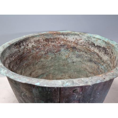 2 - A patinated studded Copper, 11.5