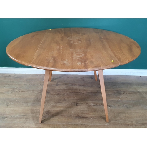 20 - An Ercol dropleaf Kitchen Table on splayed tapered supports,28in H x 49 in L x 45in W and a set of f... 