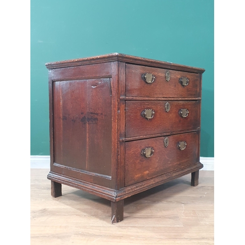 26 - An Early 18th Century oak Chest of three long graduated Drawers on square supports, 2ft 5in High x 2... 