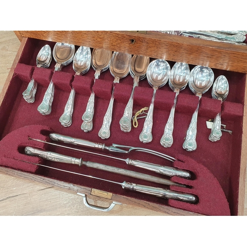 31 - An oak Canteen of stainless steel Sheffield Cutlery for 12 persons (?), (R2)