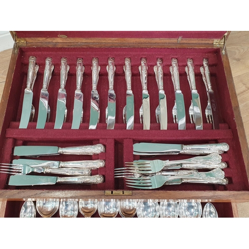 31 - An oak Canteen of stainless steel Sheffield Cutlery for 12 persons (?), (R2)