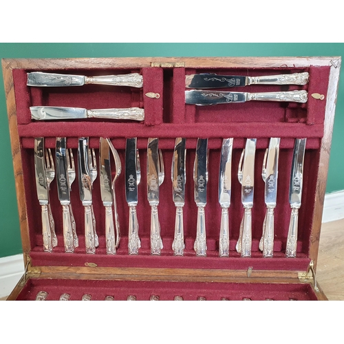 31 - An oak Canteen of stainless steel Sheffield Cutlery for 12 persons (?), (R2)