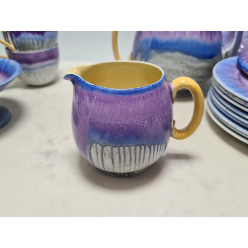 313 - A Shelley part Tea Service with drip glaze design in blue, mauve, and grey glazes, including Teapot ... 