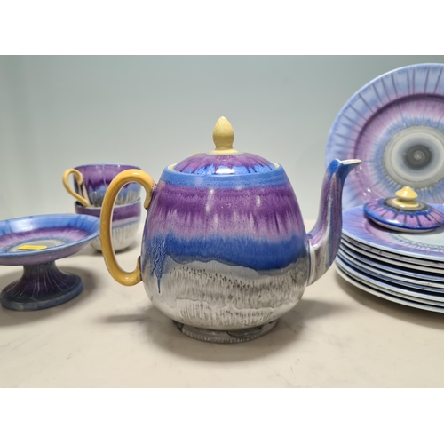 313 - A Shelley part Tea Service with drip glaze design in blue, mauve, and grey glazes, including Teapot ... 