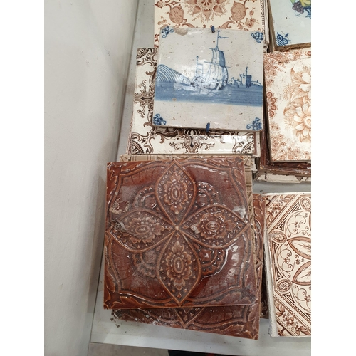 347 - A collection of ceramic Tiles including two Delft style Tiles, and Tiles with floral designs, (R5)