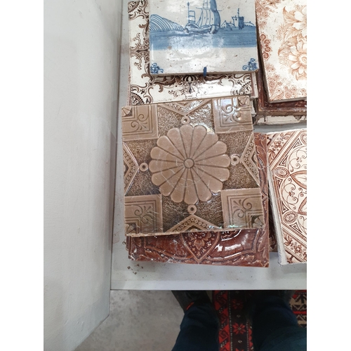 347 - A collection of ceramic Tiles including two Delft style Tiles, and Tiles with floral designs, (R5)