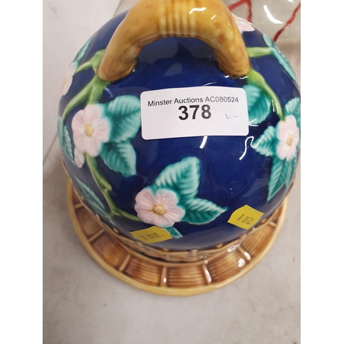 378 - A Majolica style domed Cheese Dish and Cover, and a glass table Centrepiece with four flutes (R5)