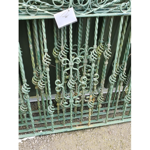 394 - Four green painted wrought iron Garden Gates and Posts 5ft 11in W x 3ft 6in H