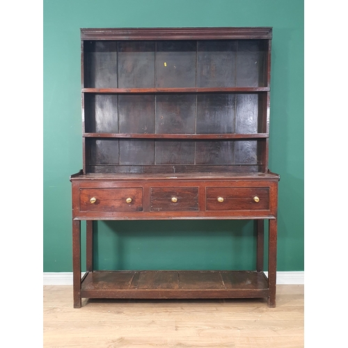 43 - An antique oak Pot board Dresser and Rack, the graduated rack, above three fitted drawers on square ... 