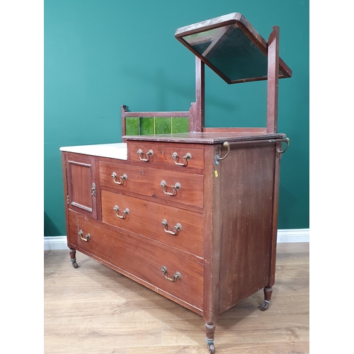 452 - A mahogany mirror and tile backed Sideboard/Dressing Chest with part marble top, four fitted drawers... 