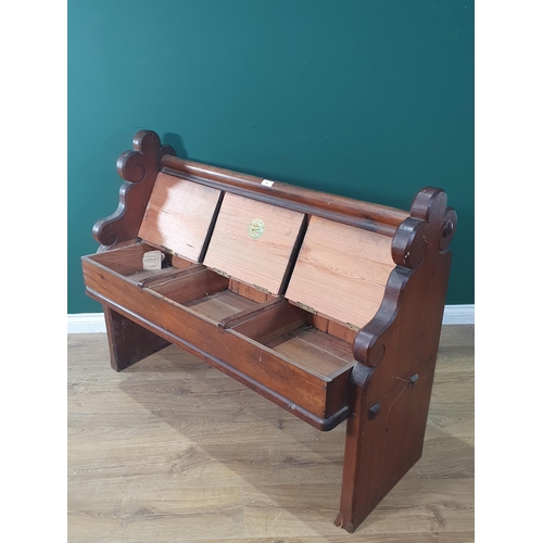 46 - A Victorian pitch pine Pew with shaped ends and backrest and three section box seat, 38