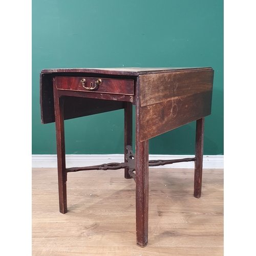 6 - An antique mahogany Pembroke Table with single fitted drawer, raised on chamfered supports united by... 