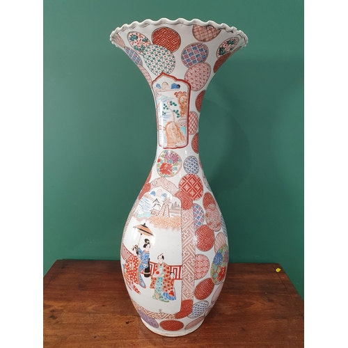 A large Japanese floor Vase with wavy flared rim and decorated figures