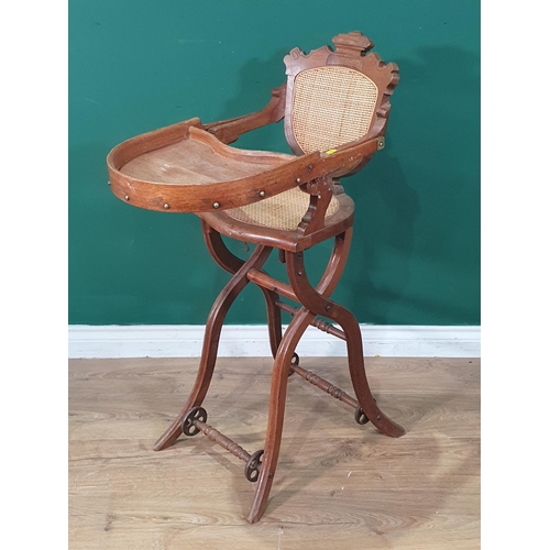 670 - A High Chair with cane back and seat (R10)