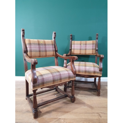 679 - A pair of tartan upholstered Elbow Chairs with carved mask decoration, scrolled arms on turned suppo... 