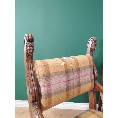 679 - A pair of tartan upholstered Elbow Chairs with carved mask decoration, scrolled arms on turned suppo... 