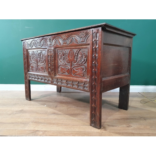 680 - A 17th Century West County Coffer with tulip carved panel front on stile supports, 2ft 5in H x 3ft 1... 