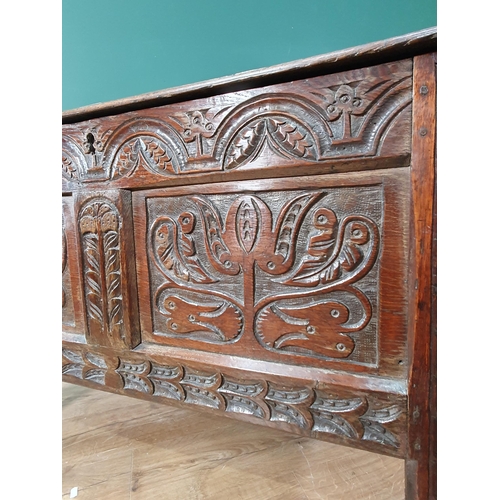 680 - A 17th Century West County Coffer with tulip carved panel front on stile supports, 2ft 5in H x 3ft 1... 