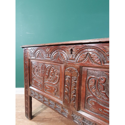 680 - A 17th Century West County Coffer with tulip carved panel front on stile supports, 2ft 5in H x 3ft 1... 