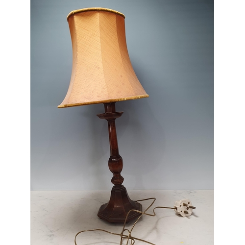 686 - A turned wooden Table Lamp with weighted base, failed PAT (flex), (R9)