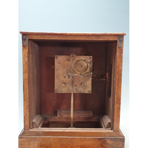 688 - A walnut cased Mantle Clock with brass inlaid decoration, white painted dial, label verso for Winter... 