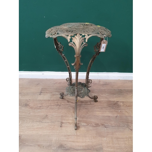 695 - A pierced cast brass two tier Table, 2ft 5in H (R10)