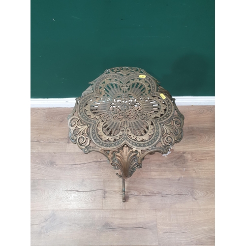 695 - A pierced cast brass two tier Table, 2ft 5in H (R10)