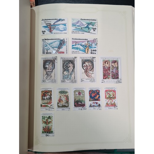 63 - A modern All World Stamp Selection in a Simplex Album, an Album containing GB First Day Covers, a Pa... 