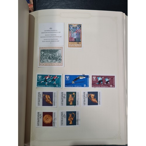 63 - A modern All World Stamp Selection in a Simplex Album, an Album containing GB First Day Covers, a Pa... 