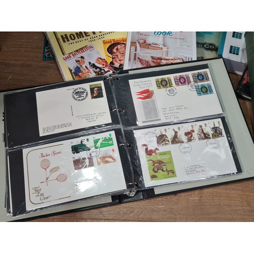 63 - A modern All World Stamp Selection in a Simplex Album, an Album containing GB First Day Covers, a Pa... 