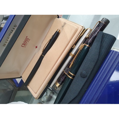 203 - Fountain Pens: Four Waterman Pens (three in cases), A Parker Sonnet Pen, another Parker Pen, a Cross... 