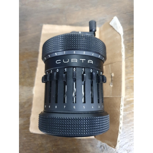 61 - A Curta Calculator, quantity of Slide Rules, Micrometer, Box Camera, Seal Set, etc (R3)