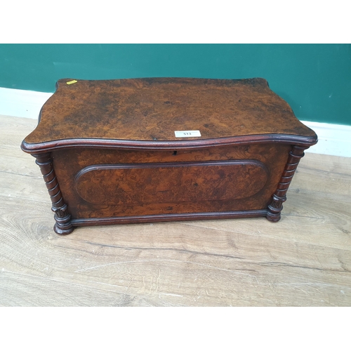 486 - A burr walnut veneered Sewing Box, the hinged lid enclosing multiple compartments, with four twist d... 