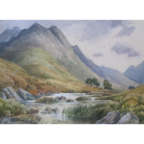 240 - GERALD HOLMES. A mountainous river landscape, signed, watercolour,10 x 14 in