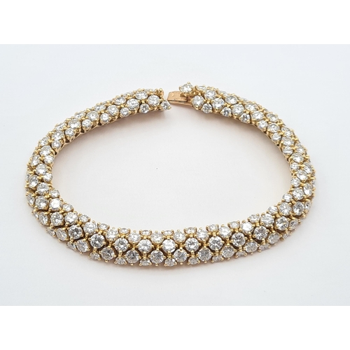 199 - A 1964 VAN CLEEF & ARPELS 'Ruban Bombé' Diamond Bracelet, claw-set approx 150 brilliant-cut stones t... 