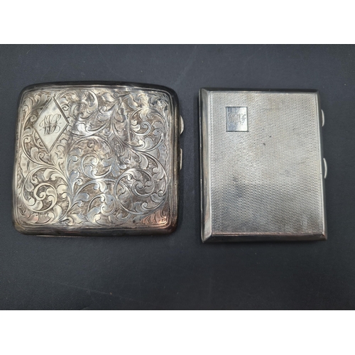 101 - A George V silver Cigarette Case with engine turning, Birmingham 1920, and another, Birmingham 1928