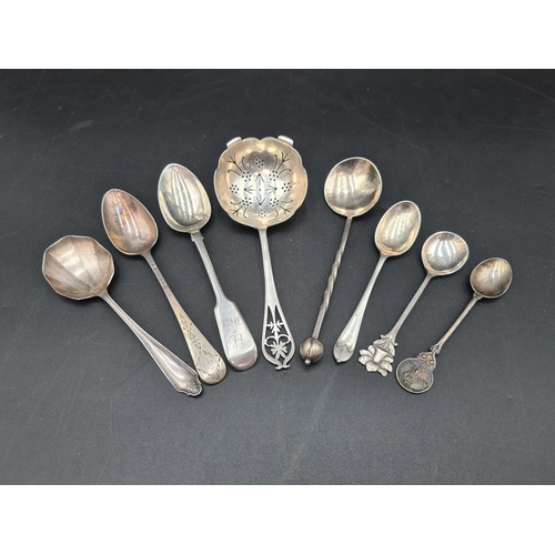 104 - A George VI silver Tea Strainer, Sheffield 1947, a designer Spoon, Birmingham 1923, maker: A E Jones... 