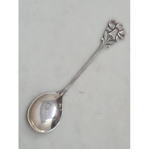 104 - A George VI silver Tea Strainer, Sheffield 1947, a designer Spoon, Birmingham 1923, maker: A E Jones... 