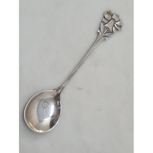 104 - A George VI silver Tea Strainer, Sheffield 1947, a designer Spoon, Birmingham 1923, maker: A E Jones... 