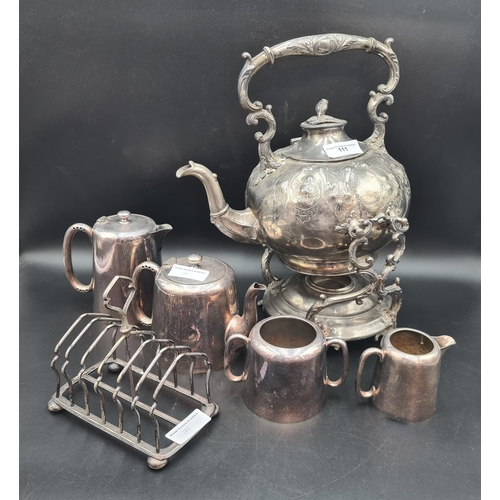 111 - An E.P.B.M Kettle on Stand, plated four piece Tea Service and a Toastrack (R3)