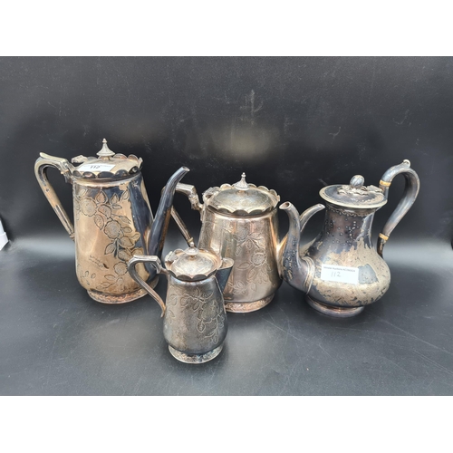 112 - A Victorian plated three piece Tea Service with floral engraving, and a similar Coffee Pot