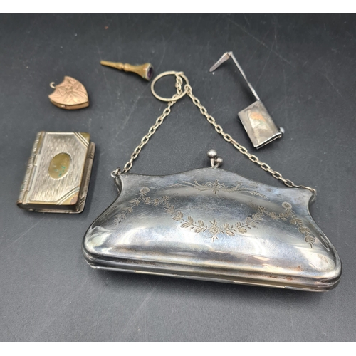 127 - A plated Purse engraved swags, a Vesta Case in form of a book, hinged Menu Holder,  gilt Locket and ... 