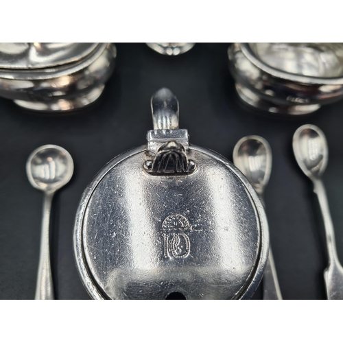 129 - Two plated Mustard Pots, a Salt and a Pepperette all with P & O logo by Mappin & Webb, and three Con... 