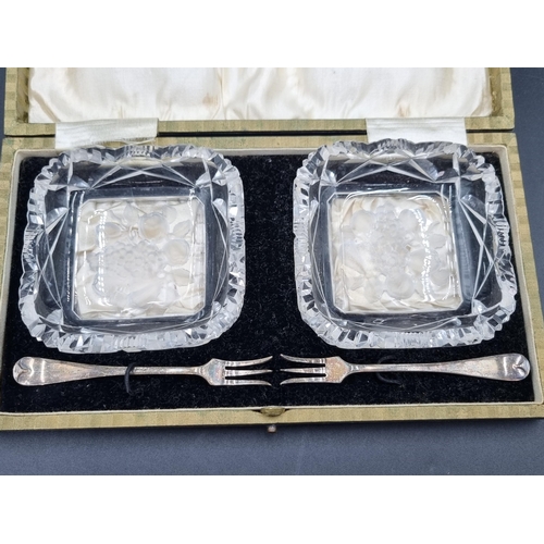 136 - A pair of square Pickle Dishes with moulded fruit bases and a pair of silver Pickle Forks, Sheffield... 