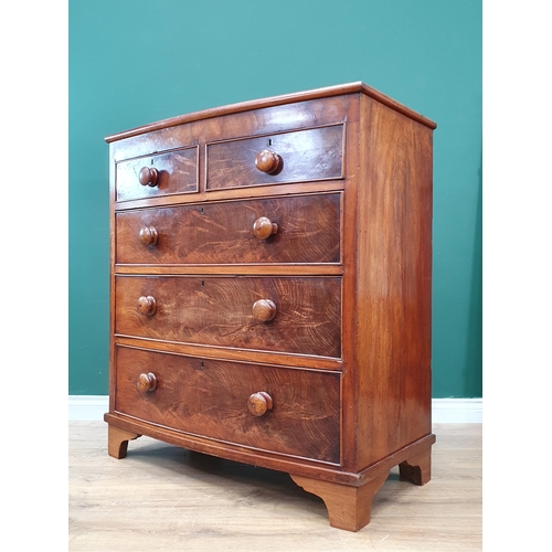 14 - A Victorian mahogany bow fronted Chest of two short over three long drawers on bracket feet 3ft 5in ... 