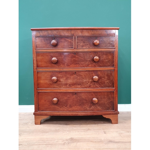 14 - A Victorian mahogany bow fronted Chest of two short over three long drawers on bracket feet 3ft 5in ... 