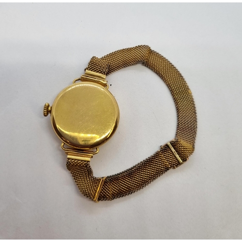 159 - A lady's 9ct gold cased Wristwatch the circular with gold arabic numerals and hands, octagonal bezel... 